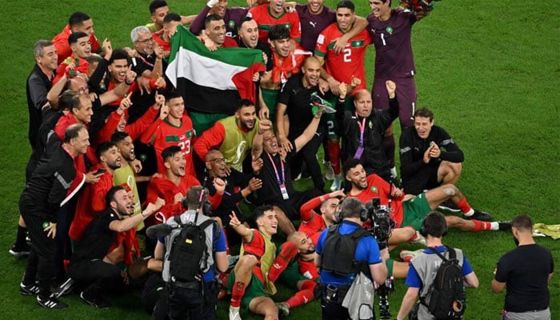 FIFA World Cup: Moroccan players wave the flag of Palestine after the victory